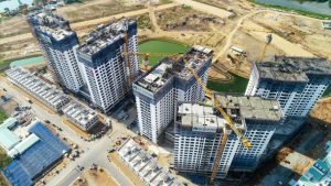 Khó giảm giá nhà ở vì tiền sử dụng đất cao